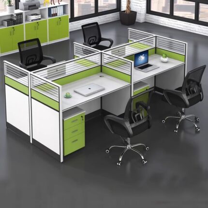 Transform your workplace with the 4-Way Modular Office Workstation, a versatile and efficient office furniture solution designed to maximize productivity, organization, and collaboration. Perfect for corporate offices, call centers, startups, and shared work environments, this workstation provides a practical layout that allows multiple users to work comfortably while optimizing available floor space. Designed with a modern modular structure, the 4-Way Office Workstation creates a professional and organized workspace where four employees can work together efficiently. Its smart configuration promotes teamwork while maintaining individual work areas, making it an ideal choice for businesses looking to create a productive and flexible office environment. The workstation features durable materials and a sturdy construction built to withstand everyday office demands. Each desk area provides ample workspace for computers, documents, and essential office accessories, helping employees maintain a clean and organized setup. The modular design also allows easy customization and future expansion, making it a cost-effective choice for growing businesses. With its sleek and contemporary appearance, the 4-Way Modular Office Workstation enhances the overall look of any office interior. Its professional design complements various office styles, from modern corporate spaces to creative work environments. Cable management options help keep wires organized, creating a cleaner and more efficient workspace. Whether you are setting up a new office or upgrading an existing one, this modular workstation delivers the perfect balance of functionality, comfort, and style. It encourages better communication among team members while providing enough personal space for focused tasks. The ergonomic layout supports employee comfort, helping improve productivity throughout the workday. Key Features: Four-person modular workstation design for efficient space utilization Ideal for offices, coworking spaces, and team environments Durable construction for long-term office use Spacious work surfaces for computers and office essentials Modern design that enhances professional interiors Flexible modular layout for easy expansion and customization Helps promote collaboration while maintaining personal work areas