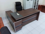 office desk, office desks, office desk for sale, office desk Kenya, office desk Nairobi, office workstation desk, executive office desk, modern office desk, wooden office desk, office computer desk, office work desk, professional office desk, business office desk, manager office desk, director office desk, CEO office desk, executive workstation desk, office desk with drawers, office desk with storage, office desk with cabinet, office desk with pedestal, office desk with shelves, office desk with lockable drawers, office desk with cable management, office desk with return, office desk with side extension, office desk with mobile pedestal, office desk for home office, office desk for corporate offices, office desk for startups, office desk for businesses, office desk for schools, office desk for universities, office desk for banks, office desk for hospitals, office desk for government offices, office desk for NGOs, office furniture desk, workstation table, office workstation table, office desk furniture, office workspace desk, office writing desk, office study desk, compact office desk, large office desk, premium office desk, luxury office desk, affordable office desk, durable office desk, stylish office desk, ergonomic office desk, contemporary office desk, minimalist office desk, commercial office desk, corporate office desk, professional workstation, office desk design, modern desk design, executive desk design, office desk setup, office desk solutions, office desk collection, office desk supplier, office desk manufacturer, office desk distributor, office desk store, office desk shop, office desk online, office desk delivery, office desk installation, office desk assembly, office desk warranty, office desk accessories, office desk organizer, office desk storage solutions, office desk workstation, office desk package, office desk and chair set, office desk set, executive office workstation, modular office desk, office desk system, office workstation furniture, office desk for productivity, office desk for professionals, office desk for executives, office desk for managers, office desk for employees, office desk for reception areas, office desk for workspaces, office desk for meeting rooms, office desk for coworking spaces, office desk for commercial use, office desk for business environments, office desk with modern finish, office desk with wood grain finish, office desk with metal frame, office desk with sturdy construction, office desk with spacious surface, office desk with ample workspace, office desk with premium materials, office desk with elegant design, office desk with contemporary style, office desk with professional appearance, office desk with durable top, office desk with scratch resistant surface, office desk with easy maintenance, office desk with storage compartments, office desk with filing drawers, office desk with keyboard tray, office desk with monitor stand, office desk with privacy panel, office desk with integrated storage, office desk with office organization features, office desk for multitasking, office desk for computer work, office desk for paperwork, office desk for office administration, office desk for remote work, office desk for home workspace, office desk for study room, office desk for shared offices, office desk for open plan offices, office desk for executive suites, office desk for private offices, office desk for conference rooms, office desk for boardrooms, office desk for collaborative workspaces, office desk for team workstations, office desk for modern offices,