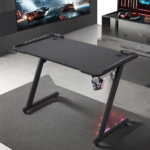 gaming table, gaming desk, gaming workstation, gamer desk, gaming computer desk, gaming setup table, RGB gaming table, RGB gaming desk, LED gaming desk, home gaming desk, professional gaming desk, esports desk, PC gaming desk, gaming workstation desk, gaming furniture, gaming room furniture, gaming office desk, gaming computer table, modern gaming desk, premium gaming desk, luxury gaming desk, ergonomic gaming desk, gaming desk with monitor shelf, gaming desk with cable management, gaming desk with headset hook, gaming desk with cup holder, gaming desk with keyboard tray, gaming desk with storage, gaming desk with drawers, gaming desk with shelves, gaming desk with monitor stand, gaming desk with CPU stand, gaming desk with LED lighting, gaming desk with RGB lights, L shaped gaming desk, corner gaming desk, compact gaming desk, large gaming desk, small gaming desk, minimalist gaming desk, carbon fiber gaming desk, black gaming desk, white gaming desk, wooden gaming desk, steel frame gaming desk, heavy duty gaming desk, durable gaming desk, scratch resistant gaming desk, waterproof gaming desk, heat resistant gaming desk, gaming table Kenya, gaming desk Kenya, gaming table Nairobi, gaming desk Nairobi, gaming furniture Kenya, gaming desk supplier Kenya, gaming desk showroom, gaming desk wholesaler, gaming desk retailer, gaming desk distributor, gaming desk online, buy gaming desk online, gaming desk price Kenya, affordable gaming desk, best gaming desk, quality gaming desk, imported gaming desk, office furniture Kenya, computer desk, computer workstation desk, study desk, home office gaming desk, gaming desk for home office, gaming desk for students, gaming desk for professionals, gaming desk for streamers, gaming desk for content creators, gaming desk for YouTubers, gaming desk for Twitch streamers, gaming desk for esports players, gaming desk for gamers, gaming desk for dual monitors, gaming desk for triple monitors, gaming desk for single monitor setup, gaming desk for desktop computers, gaming desk for laptops, gaming desk for gaming PC, gaming desk for PlayStation, gaming desk for Xbox, gaming desk for Nintendo Switch, gaming desk for console gaming, gaming desk for PC gaming setup, gaming desk for racing simulator, gaming desk for VR gaming, gaming desk with ergonomic design, gaming desk with spacious worktop, gaming desk with premium finish, gaming desk with reinforced steel frame, gaming desk with sturdy construction, gaming desk with modern design, gaming desk with elegant appearance, gaming desk with cable routing holes, gaming desk with power management, gaming desk with adjustable feet, gaming desk with stable frame, gaming desk with premium craftsmanship, gaming desk with quality materials, gaming desk with long lasting durability, gaming desk with stylish appearance, gaming desk with sleek finish, gaming desk with commercial grade construction, gaming desk with modern aesthetics, gaming desk with contemporary design, gaming desk with carbon fiber texture, gaming desk with durable laminate surface, gaming desk with ergonomic layout, gaming desk with optimized workspace, gaming desk with spacious legroom, gaming desk with practical storage, gaming desk with premium office appeal, gaming desk designed for gaming, gaming desk designed for productivity, gaming desk designed for streaming, gaming desk built for daily use, gaming desk built for heavy equipment, gaming desk for gaming rooms, gaming desk for bedrooms, gaming desk for apartments, gaming desk for offices, gaming desk for studios, gaming desk for gaming cafés, gaming desk for schools, gaming desk for universities, gaming desk for training centers, gaming desk for coworking spaces, gaming desk for businesses, gaming desk for modern interiors, gaming desk for stylish gaming setups