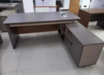 office desk, office desks, executive office desk, executive desk, office table, office workstation, office computer desk, office writing desk, modern office desk, contemporary office desk, premium office desk, luxury office desk, ergonomic office desk, professional office desk, business office desk, corporate office desk, manager office desk, director office desk, CEO office desk, executive manager desk, executive workstation, wooden office desk, mahogany office desk, MDF office desk, laminated office desk, melamine office desk, engineered wood office desk, steel office desk, metal office desk, office desk with drawers, office desk with storage, office desk with side extension, office desk with pedestal, office desk with lockable drawers, office desk with cable management, office desk with modesty panel, office desk with return, L shaped office desk, corner office desk, U shaped office desk, straight office desk, compact office desk, large office desk, small office desk, home office desk, study desk, study table, computer workstation, office furniture, office furniture Kenya, office furniture Nairobi, office desks Kenya, office desks Nairobi, executive office furniture, office furniture supplier, office furniture store, office furniture showroom, office furniture online, office furniture shop, office furniture for sale, office desk supplier Kenya, office desk manufacturer, office desk distributor, office desk importer, office desk wholesaler, office desk retailer, office desk online Kenya, buy office desk online, affordable office desk, cheap office desk, premium office desk Kenya, high quality office desk, durable office desk, commercial office desk, workspace desk, office desk for professionals, office desk for executives, office desk for managers, office desk for directors, office desk for CEOs, office desk for startups, office desk for businesses, office desk for corporate offices, office desk for government offices, office desk for schools, office desk for universities, office desk for colleges, office desk for banks, office desk for hospitals, office desk for clinics, office desk for hotels, office desk for reception, office desk for offices, office desk for home workspace, executive computer desk, manager workstation, director workstation, CEO workstation, executive writing desk,