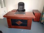 Office Desk Supplier in Kenya. office desk, office desks, office desk Kenya, office desks Kenya, executive office desk, executive office table, office workstation, office workstation desk, computer desk, computer table, study desk, home office desk, modern office desk, wooden office desk, ergonomic office desk, office writing desk, office table, manager desk, CEO office desk, director office desk, executive workstation, L-shaped office desk, corner office desk, reception desk, office desk with drawers, office desk with storage, office desk with cabinet, office desk with shelves, office desk with lockable drawers, office desk with cable management, standing office desk, height adjustable desk, electric standing desk, office desk for home, office desk for office, office desk for business, commercial office desk, office furniture Kenya, office desk Nairobi, office desk Mombasa, office desk Kisumu, office desk Nakuru, office desk Eldoret, office desk Thika, office desk Ruiru, office desk Nyeri, office desk Meru, office desk Machakos, office desk Naivasha, office desk Kakamega, office desk Kisii, office desk Bungoma, office desk Kitale, office desk Embu, office desk Malindi, office desk Nanyuki, office desk Garissa, premium office desk, luxury office desk, affordable office desk, durable office desk, heavy duty office desk, executive office furniture, office workstation furniture, modular office workstation, office desk supplier Kenya, office desk manufacturer Kenya, office desk distributor Kenya, office desk wholesaler Kenya, office desk showroom Kenya, office desk online Kenya, buy office desk online, office desk delivery Kenya, office desk price Kenya, office desk sale, office desk deals, best office desk, quality office desk, custom office desk, office desk and chair, office desk set, office desk for professionals, office desk for executives, office desk for managers, office desk for staff, office desk for startups, office desk for schools, office desk for institutions, office desk with side return, office desk with mobile pedestal, office desk with modesty panel, office desk with keyboard tray, office desk with wooden finish, office desk with metal frame, modern executive desk, minimalist office desk, contemporary office desk, office furniture supplier Kenya, workspace furniture, business office furniture, office desk solutions, office desk collection, office desk near me, office furniture online Kenya, professional office desk, stylish office desk, office workspace solutions, executive office table Kenya, office desk shopping Kenya, office desk store Kenya, office desk accessories, office desk organizer, office desk for productivity, office desk for remote work, high quality office desk.