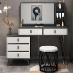 Dressing table, modern dressing table, dressing table with mirror, vanity table, makeup table, makeup vanity, bedroom dressing table, wooden dressing table, dressing table Kenya, dressing table Nairobi, dressing table supplier Kenya, dressing table for sale, buy dressing table online, dressing table price Kenya, affordable dressing table, luxury dressing table, premium dressing table, contemporary dressing table, minimalist dressing table, stylish dressing table, elegant dressing table, dressing table with LED mirror, LED dressing table, illuminated dressing table, dressing table with lights, Hollywood mirror dressing table, dressing table with drawers, dressing table with storage, dressing table with cabinet, dressing table with shelves, dressing table with stool, dressing table with chair, dressing table set, vanity table with mirror, bedroom vanity unit, cosmetic table, beauty station, makeup station, makeup desk, makeup organizer table, beauty vanity, dressing mirror table, cosmetic vanity table, bedroom furniture, modern bedroom furniture, wooden vanity table, MDF dressing table, laminated dressing table, engineered wood dressing table, melamine dressing table, glossy dressing table, matte finish dressing table, white dressing table, black dressing table, walnut dressing table, oak dressing table, mahogany dressing table, grey dressing table, brown dressing table, cream dressing table, compact dressing table, space saving dressing table, corner dressing table, wall mounted dressing table, freestanding dressing table, luxury vanity table, elegant vanity table, modern vanity furniture, bedroom vanity furniture, makeup furniture, cosmetic storage table, dressing table with large mirror, dressing table with full length mirror, dressing table with sliding mirror, dressing table with hidden storage, dressing table with multiple drawers, dressing table with jewelry storage, dressing table with organizer, dressing table with lockable drawer, dressing table with glass top, dressing table with cushioned stool, dressing table with upholstered stool, dressing table with soft close drawers, dressing table with premium finish, scratch resistant dressing table, moisture resistant dressing table, durable dressing table, heavy duty dressing table, easy clean dressing table, bedroom storage furniture, vanity mirror with lights, LED makeup mirror, dressing table with touch sensor mirror, dressing table with dimmable LED lights, smart dressing table, contemporary vanity desk, bedroom makeup desk, beauty desk, dressing table for women, dressing table for girls, dressing table for teens, dressing table for master bedroom, dressing table for guest room, dressing table for apartments, dressing table for homes, dressing table for modern homes, dressing table for luxury homes, dressing table for small bedrooms, dressing table for large bedrooms, compact vanity table, spacious vanity table, dressing table with spacious storage, dressing table with side cabinet, dressing table with open shelves, dressing table with concealed storage, dressing table with decorative mirror, designer dressing table, classic dressing table, Scandinavian dressing table, industrial dressing table, luxury bedroom vanity, premium bedroom furniture, home furniture Kenya, bedroom furniture Kenya, home décor furniture, modern home furniture, contemporary bedroom furniture, stylish bedroom furniture, elegant bedroom furniture, luxury bedroom furniture, affordable bedroom furniture, dressing table online Kenya, dressing table showroom Nairobi, dressing table wholesale Kenya