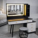 Dressing table, modern dressing table, dressing table with mirror, vanity table, makeup table, makeup vanity, bedroom dressing table, wooden dressing table, dressing table Kenya, dressing table Nairobi, dressing table supplier Kenya, dressing table for sale, buy dressing table online, dressing table price Kenya, affordable dressing table, luxury dressing table, premium dressing table, contemporary dressing table, minimalist dressing table, stylish dressing table, elegant dressing table, dressing table with LED mirror, LED dressing table, illuminated dressing table, dressing table with lights, Hollywood mirror dressing table, dressing table with drawers, dressing table with storage, dressing table with cabinet, dressing table with shelves, dressing table with stool, dressing table with chair, dressing table set, vanity table with mirror, bedroom vanity unit, cosmetic table, beauty station, makeup station, makeup desk, makeup organizer table, beauty vanity, dressing mirror table, cosmetic vanity table, bedroom furniture, modern bedroom furniture, wooden vanity table, MDF dressing table, laminated dressing table, engineered wood dressing table, melamine dressing table, glossy dressing table, matte finish dressing table, white dressing table, black dressing table, walnut dressing table, oak dressing table, mahogany dressing table, grey dressing table, brown dressing table, cream dressing table, compact dressing table, space saving dressing table, corner dressing table, wall mounted dressing table, freestanding dressing table, luxury vanity table, elegant vanity table, modern vanity furniture, bedroom vanity furniture, makeup furniture, cosmetic storage table, dressing table with large mirror, dressing table with full length mirror, dressing table with sliding mirror, dressing table with hidden storage, dressing table with multiple drawers, dressing table with jewelry storage, dressing table with organizer, dressing table with lockable drawer, dressing table with glass top, dressing table with cushioned stool, dressing table with upholstered stool, dressing table with soft close drawers, dressing table with premium finish, scratch resistant dressing table, moisture resistant dressing table, durable dressing table, heavy duty dressing table, easy clean dressing table, bedroom storage furniture, vanity mirror with lights, LED makeup mirror, dressing table with touch sensor mirror, dressing table with dimmable LED lights, smart dressing table, contemporary vanity desk, bedroom makeup desk, beauty desk, dressing table for women, dressing table for girls, dressing table for teens, dressing table for master bedroom, dressing table for guest room, dressing table for apartments, dressing table for homes, dressing table for modern homes, dressing table for luxury homes, dressing table for small bedrooms, dressing table for large bedrooms, compact vanity table, spacious vanity table, dressing table with spacious storage, dressing table with side cabinet, dressing table with open shelves, dressing table with concealed storage, dressing table with decorative mirror, designer dressing table, classic dressing table, Scandinavian dressing table, industrial dressing table, luxury bedroom vanity, premium bedroom furniture, home furniture Kenya, bedroom furniture Kenya, home décor furniture, modern home furniture, contemporary bedroom furniture, stylish bedroom furniture, elegant bedroom furniture, luxury bedroom furniture, affordable bedroom furniture, dressing table online Kenya, dressing table showroom Nairobi, dressing table wholesale Kenya