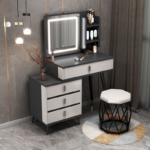 Dressing table, modern dressing table, dressing table with mirror, vanity table, makeup table, makeup vanity, bedroom dressing table, wooden dressing table, dressing table Kenya, dressing table Nairobi, dressing table supplier Kenya, dressing table for sale, buy dressing table online, dressing table price Kenya, affordable dressing table, luxury dressing table, premium dressing table, contemporary dressing table, minimalist dressing table, stylish dressing table, elegant dressing table, dressing table with LED mirror, LED dressing table, illuminated dressing table, dressing table with lights, Hollywood mirror dressing table, dressing table with drawers, dressing table with storage, dressing table with cabinet, dressing table with shelves, dressing table with stool, dressing table with chair, dressing table set, vanity table with mirror, bedroom vanity unit, cosmetic table, beauty station, makeup station, makeup desk, makeup organizer table, beauty vanity, dressing mirror table, cosmetic vanity table, bedroom furniture, modern bedroom furniture, wooden vanity table, MDF dressing table, laminated dressing table, engineered wood dressing table, melamine dressing table, glossy dressing table, matte finish dressing table, white dressing table, black dressing table, walnut dressing table, oak dressing table, mahogany dressing table, grey dressing table, brown dressing table, cream dressing table, compact dressing table, space saving dressing table, corner dressing table, wall mounted dressing table, freestanding dressing table, luxury vanity table, elegant vanity table, modern vanity furniture, bedroom vanity furniture, makeup furniture, cosmetic storage table, dressing table with large mirror, dressing table with full length mirror, dressing table with sliding mirror, dressing table with hidden storage, dressing table with multiple drawers, dressing table with jewelry storage, dressing table with organizer, dressing table with lockable drawer, dressing table with glass top, dressing table with cushioned stool, dressing table with upholstered stool, dressing table with soft close drawers, dressing table with premium finish, scratch resistant dressing table, moisture resistant dressing table, durable dressing table, heavy duty dressing table, easy clean dressing table, bedroom storage furniture, vanity mirror with lights, LED makeup mirror, dressing table with touch sensor mirror, dressing table with dimmable LED lights, smart dressing table, contemporary vanity desk, bedroom makeup desk, beauty desk, dressing table for women, dressing table for girls, dressing table for teens, dressing table for master bedroom, dressing table for guest room, dressing table for apartments, dressing table for homes, dressing table for modern homes, dressing table for luxury homes, dressing table for small bedrooms, dressing table for large bedrooms, compact vanity table, spacious vanity table, dressing table with spacious storage, dressing table with side cabinet, dressing table with open shelves, dressing table with concealed storage, dressing table with decorative mirror, designer dressing table, classic dressing table, Scandinavian dressing table, industrial dressing table, luxury bedroom vanity, premium bedroom furniture, home furniture Kenya, bedroom furniture Kenya, home décor furniture, modern home furniture, contemporary bedroom furniture, stylish bedroom furniture, elegant bedroom furniture, luxury bedroom furniture, affordable bedroom furniture, dressing table online Kenya, dressing table showroom Nairobi, dressing table wholesale Kenya