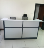 reception desk, reception desk Kenya, reception desk Nairobi, office reception desk, front office reception desk, modern reception desk, executive reception desk, office front desk, reception counter, office reception counter, front office counter, reception workstation, reception furniture, office furniture Kenya, reception furniture Kenya, office desk Kenya, modern office desk, professional reception desk, stylish reception desk, elegant reception desk, imported reception desk, imported office reception desk, imported front office desk, premium reception desk, quality reception desk, durable reception desk, contemporary reception desk, corporate reception desk, commercial reception desk, business reception desk, reception desk for office, reception desk for business, reception desk for company, reception desk for corporate office, reception desk for hotel, hotel reception desk, hotel front desk, clinic reception desk, hospital reception desk, school reception desk, college reception desk, bank reception desk, insurance reception desk, salon reception desk, spa reception desk, showroom reception desk, lobby reception desk, office lobby desk, customer service desk, customer care reception desk, visitor reception desk, receptionist desk, receptionist workstation, receptionist office desk, reception area furniture, office lobby furniture, front office furniture, customer service counter, information desk, enquiry desk, welcome desk, visitor desk, modern front desk, stylish front desk, professional front desk, executive front desk, luxury reception desk, premium front desk, durable office desk, functional reception desk, spacious reception desk, practical reception desk, ergonomic reception desk, organized reception desk, reception workstation desk, receptionist workstation desk, office workstation reception, front office workstation, reception office workstation, reception counter desk, business reception counter, commercial reception counter, corporate front desk, contemporary office furniture, modern office furniture Kenya, executive office furniture Kenya, reception furniture Nairobi, office furniture Nairobi, imported furniture Kenya, imported office furniture, reception desk supplier Kenya, office furniture supplier Kenya, reception desk dealer Kenya, office desks Nairobi