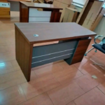 Office desk, office desks Kenya, office desk Nairobi, office table, office tables Kenya, executive office desk, executive desk Kenya, staff office desk, manager office desk, modern office desk, wooden office desk, mahogany office desk, computer office desk, workstation desk, ergonomic office desk, L-shaped office desk, straight office desk, curved office desk, reception desk, study desk, home office desk, office desk with drawers, office desk with storage, office desk with cupboard, office desk with extension, compact office desk, large office desk, professional office furniture, corporate office desk, modern office furniture Kenya, office furniture Nairobi, office furniture supplier Kenya, office desk supplier, office desks for sale, buy office desk Kenya, affordable office desk, quality office desk, durable office desk, office workstation Kenya, office furniture shop, office furniture showroom, office desk delivery Kenya, office desk installation, business office furniture, commercial office furniture, executive office furniture,